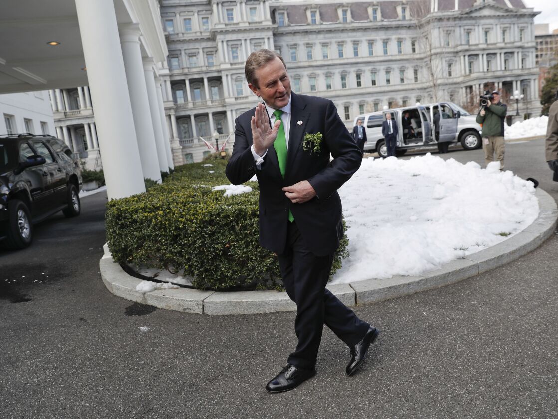 Irish Taoiseach Enda Kenny waves as he walks to his vehicle after speaking to reporters outside the West Wing of the White House on Thursday, following his meeting with President Donald Trump. | Pablo Martinez Monsivais/Associated Press